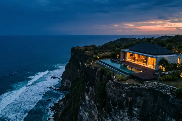 Dramatic Uluwatu clifftop villa with infinity pool above turquoise ocean